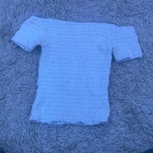 white cropped off the shoulder top